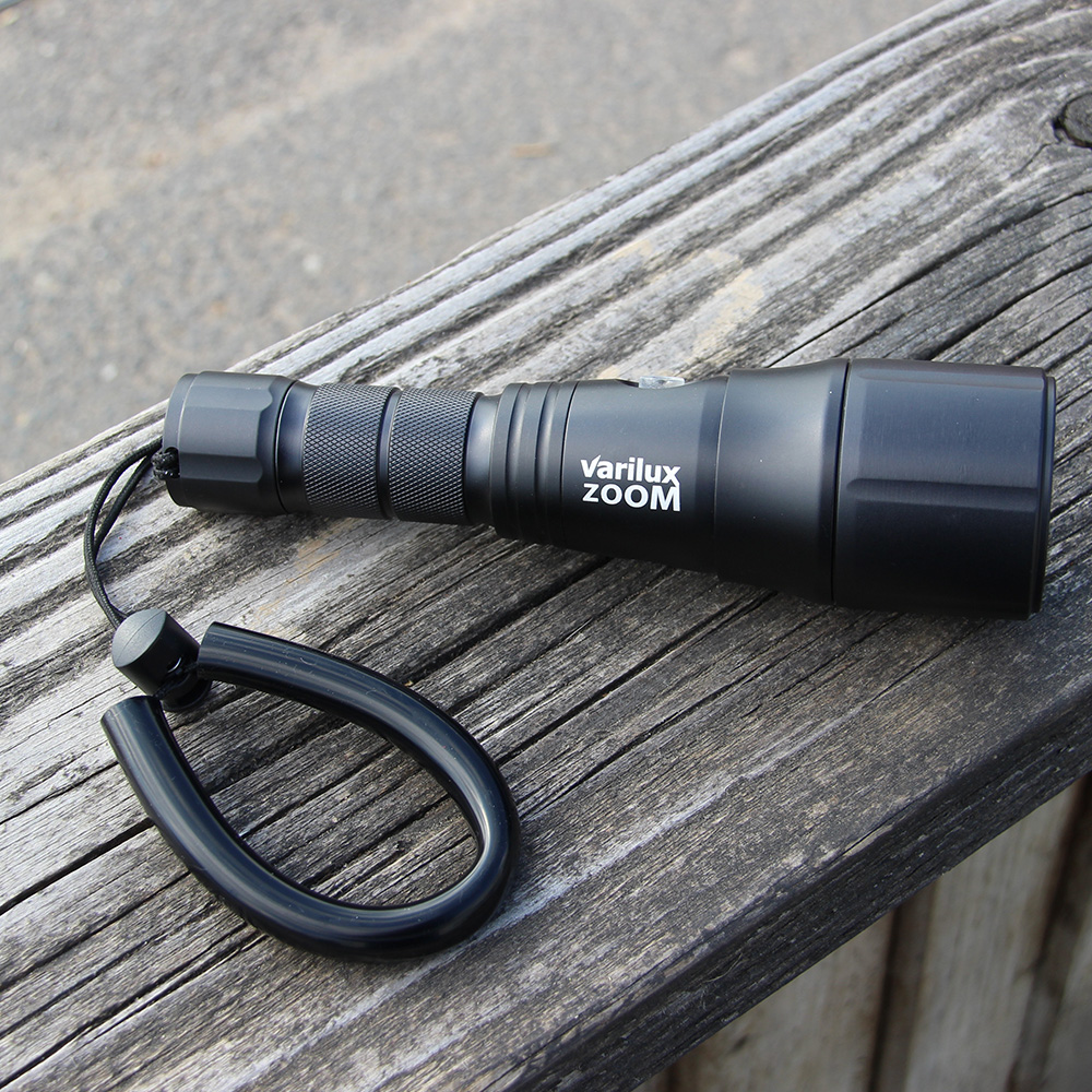 Black lanyard attached to Varilux Zoom